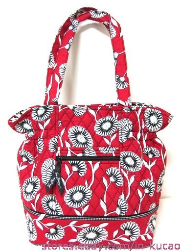 This is the Vera Bradley Laura in Deco Daisy Tote Handbag.