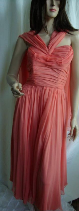 up for bid is a gorgeous vintage dress by frank starr it is made of a 