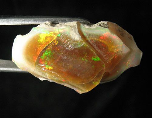 opals are shown dry and 100 % natural pictures and videos are made 